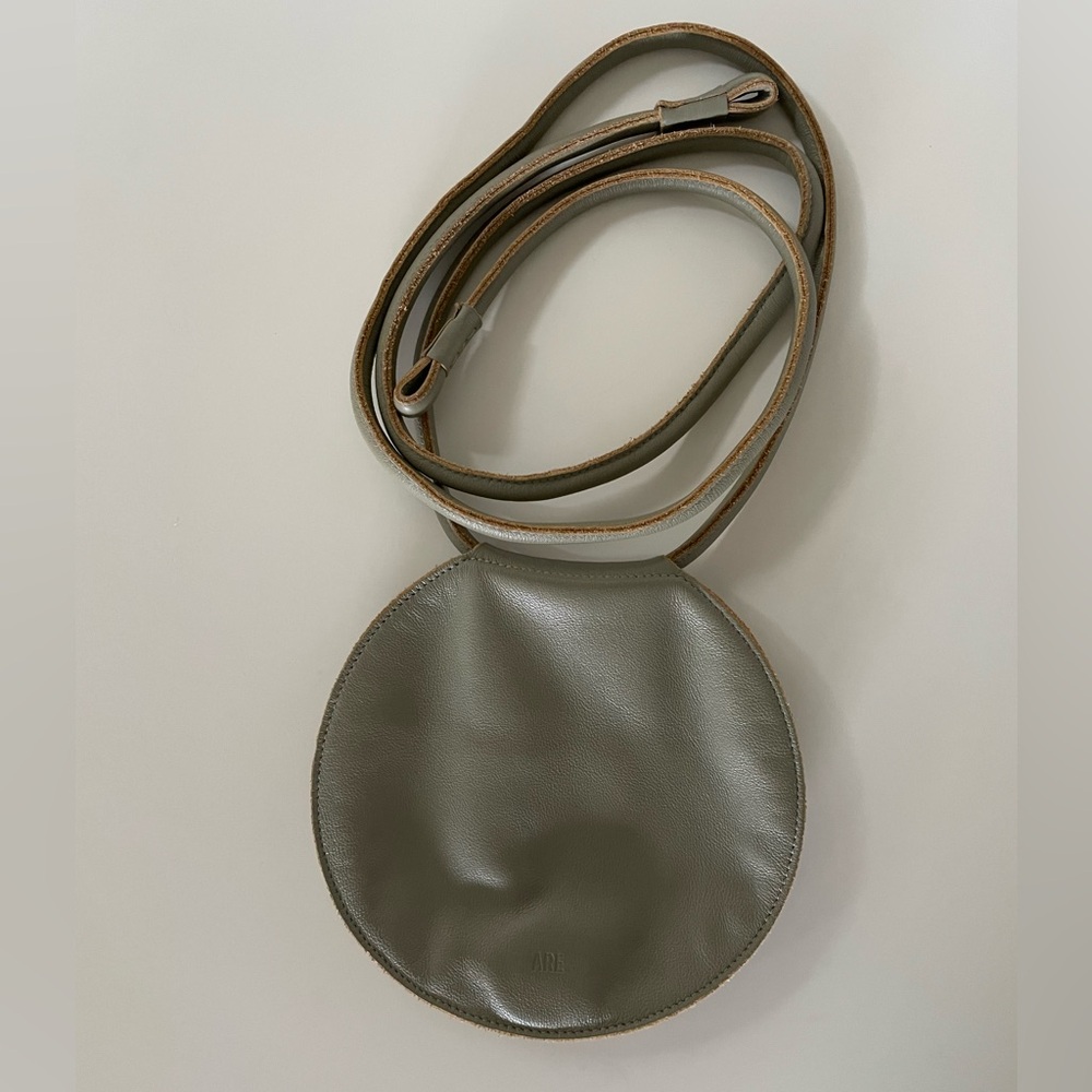 are studio disc bag / fanny bag / wristlet / over-the-shoulder / crossbody purse